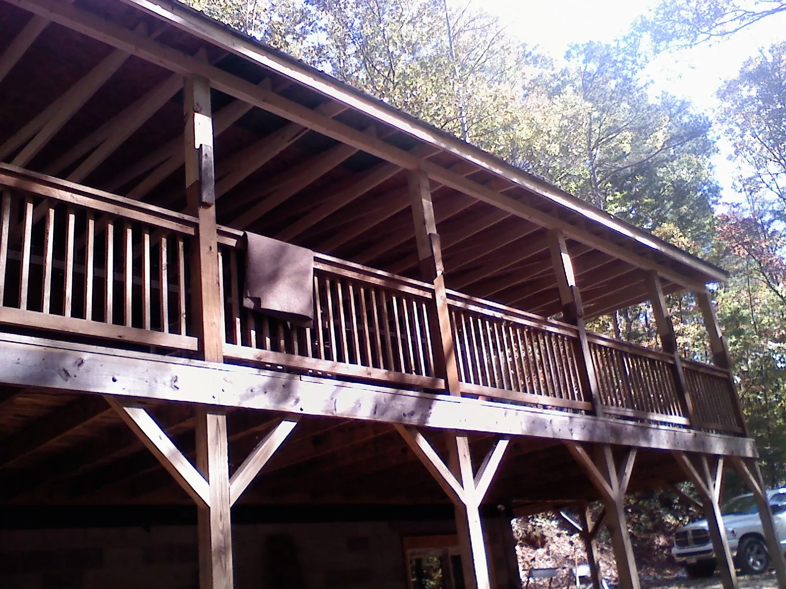 Timber framing under a new elevated porch and deck — Roof Leak Repair in Ethridge by Roofing Brothers
